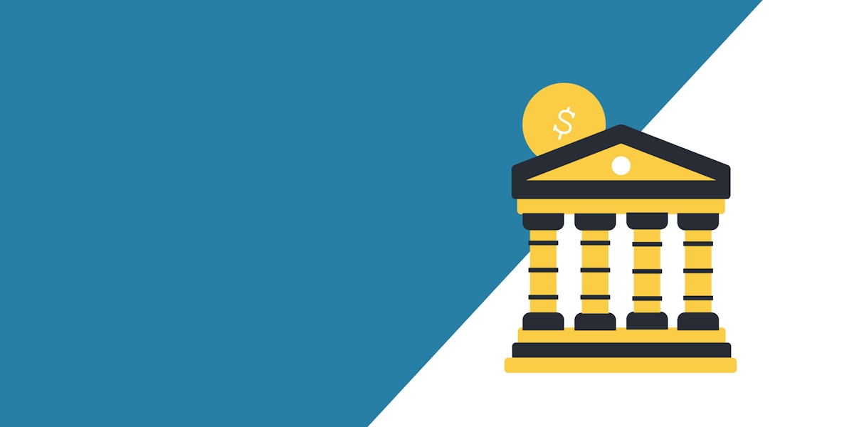 a building with a coin sitting on top of it