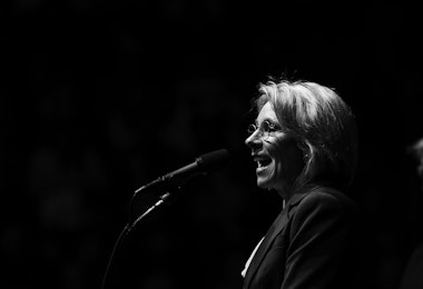 GRAND RAPIDS, MI - DECEMBER 9: (L to R) Betsy DeVos, his nominee for Secretary of Education, speaks as President-elect Donald Trump looks on at the DeltaPlex Arena, December 9, 2016 in Grand Rapids, Michigan. President-elect Donald Trump is continuing his victory tour across the country. (Photo by Drew Angerer/Getty Images)