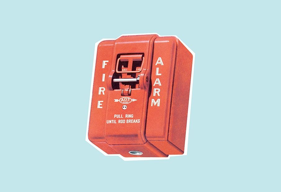 a close up of a red switch box on a blue background