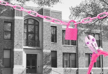 a man in a suit and tie raising his hands