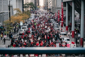 CHICAGO, IL - OCTOBER 23: Thousands of demonstrators take to the streets, stopping traffic and circling City Hall in a show support for the ongoing teachers strike on October 23, 2019 in Chicago, Illinois. Union teachers and school staff members are demanding more funding from the city in order to lower class sizes, hire more support staff, and build new affordable housing for the 16,000 Chicago Public Schools students whose families are homeless. (Photo by Scott Heins/Getty Images)