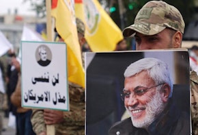 Iranian Commanders holding signage