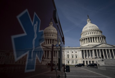 WASHINGTON, DC - MARCH 16: An ambulance sits parked on the plaza outside the U.S. Capitol March 16, 2020 in Washington, DC. After taking the weekend off, the Senate will return on Monday afternoon and will take up the House-passed coronavirus relief bill. The legislation in the House bill includes some provisions for paid emergency leave and free COVID-19 testing. (Photo by Drew Angerer/Getty Images)