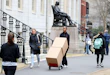 CAMBRIDGE, MASSACHUSETTS - MARCH 12: Sophomore Sadia Demby moves her belongings through Harvard Yard on the campus of Harvard University on March 12, 2020 in Cambridge, Massachusetts. Students have been asked to move out of their dorms by March 15 due to the Coronavirus (COVID-19) risk. All classes will be moved online for the rest of the spring semester. (Photo by Maddie Meyer/Getty Images)
