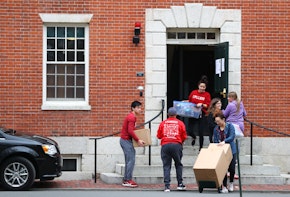 CAMBRIDGE, MASSACHUSETTS - MARCH 12: Students move out of dorm rooms on Harvard Yard on the campus of Harvard University on March 12, 2020 in Cambridge, Massachusetts. Students have been asked to move out of their dorms by March 15 due to the Coronavirus (COVID-19) risk. All classes will be moved online for the rest of the spring semester.  (Photo by Maddie Meyer/Getty Images)