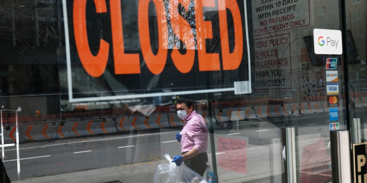 NEW YORK CITY - APRIL 17: A closed sign is displayed in the window of a business in a nearly deserted lower Manhattan on April 17, 2020 in New York City, United States. New York City has been the hardest hit city in America from COVIT-19, with overwhelmed hospitals and a struggling economy.