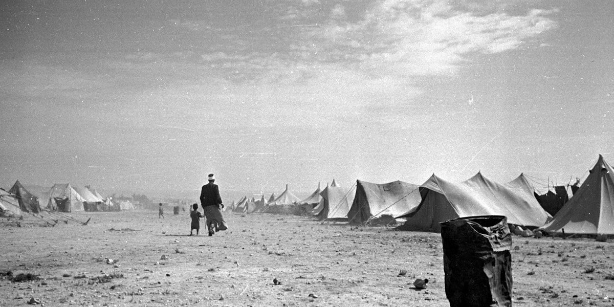 25th June 1949:  A Palestinian refugee camp near the shores of the Dead Sea in Jordan, in the year following the Arab Israeli War which marked the creation of the State of Israel. Original Publication: Picture Post - 4818 - Who'll Help The Refugee Arabs? - pub. 1949  (Photo by Charles Hewitt/Picture Post/Hulton Archive/Getty Images)