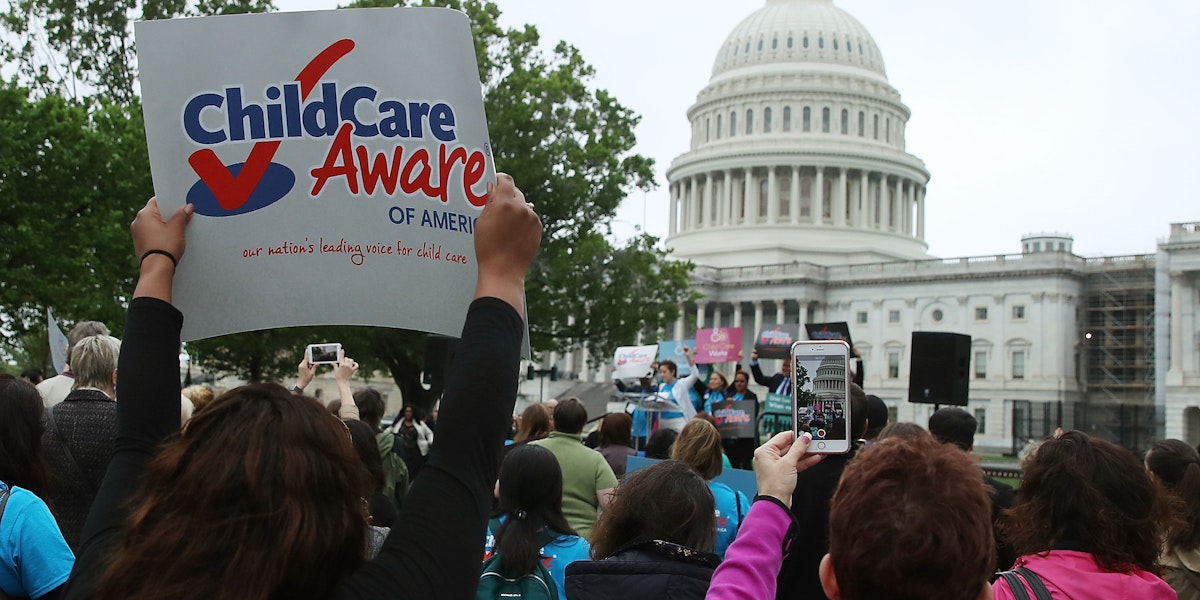 WASHINGTON, DC - APRIL 25:  People participate in an affordable child care rally at the U.S. Capitol, on April 25, 2017 in Washington, DC. The group Child Care Aware rallied to raise awareness of the need for quality, affordable child care that is accessible for all families. (Photo by Mark Wilson/Getty Images)