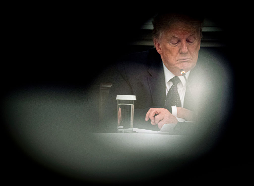 WASHINGTON, DC - MAY 18:  U.S. President Donald Trump listens during a roundtable in the State Dining Room of the White House May 18, 2020 in Washington, DC. President Trump held a roundtable meeting with Restaurant Executives and Industry Leaders at the White House today.  (Photo by Doug Mills - Pool/Getty Images)