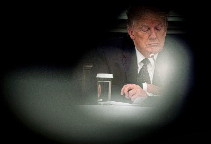 WASHINGTON, DC - MAY 18: U.S. President Donald Trump listens during a roundtable in the State Dining Room of the White House May 18, 2020 in Washington, DC. President Trump held a roundtable meeting with Restaurant Executives and Industry Leaders at the White House today. (Photo by Doug Mills - Pool/Getty Images)
