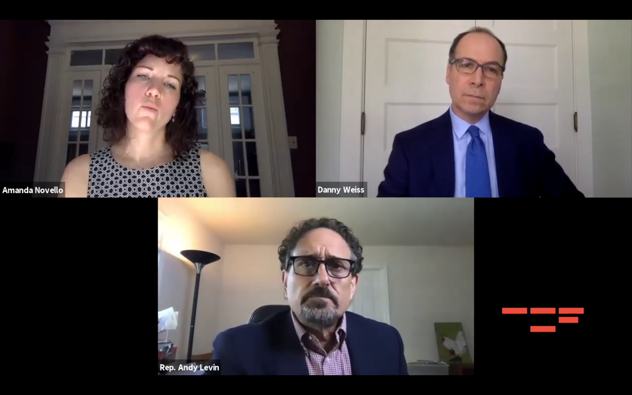 a group of three people sitting next to each other