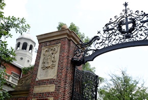 CAMBRIDGE, MASSACHUSETTS - JULY 08: A view of a gate to Harvard Yard on the campus of Harvard University on July 08, 2020 in Cambridge, Massachusetts. Harvard and Massachusetts Institute of Technology have sued the Trump administration for its decision to strip international college students of their visas if all of their courses are held online.  (Photo by Maddie Meyer/Getty Images)