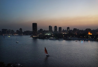 CAIRO, EGYPT - JULY 06: Boats move down the Nile at sunset on July 6, 2013 in Cairo, Egypt. Over 17 people were killed in clashes around the country yesterday with dozens injured as the Egyptian military tries to restore order. Reform leader Mohamed ElBaradei has been named interim prime minister of Egypt. Adly Mansour, chief justice of the Supreme Constitutional Court, was sworn in as the interim head of state in ceremony in Cairo in the morning of July 4, the day after Morsi was placed under house arrest by the Egyptian military and the Constitution was suspended.  (Photo by Spencer Platt/Getty Images)