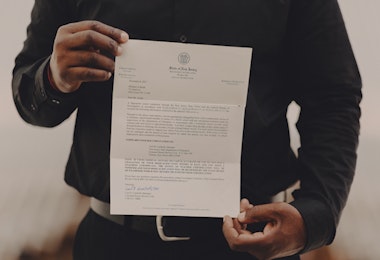A person holding a document