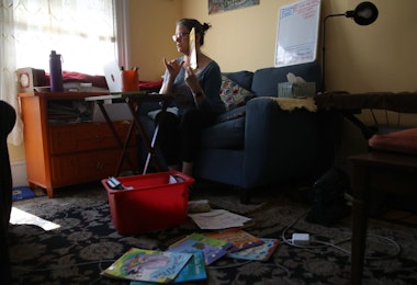 SAN FRANCISCO, CALIFORNIA - MARCH 20: Leanne Francis, first grade teacher at Harvey Milk Civil Rights Academy, conducts an online class from her living room on March 20, 2020 in San Francisco, California. With schools closed across the United States due to the COVID19 pandemic, teachers are holding some classes for students online. (Photo by Justin Sullivan/Getty Images)