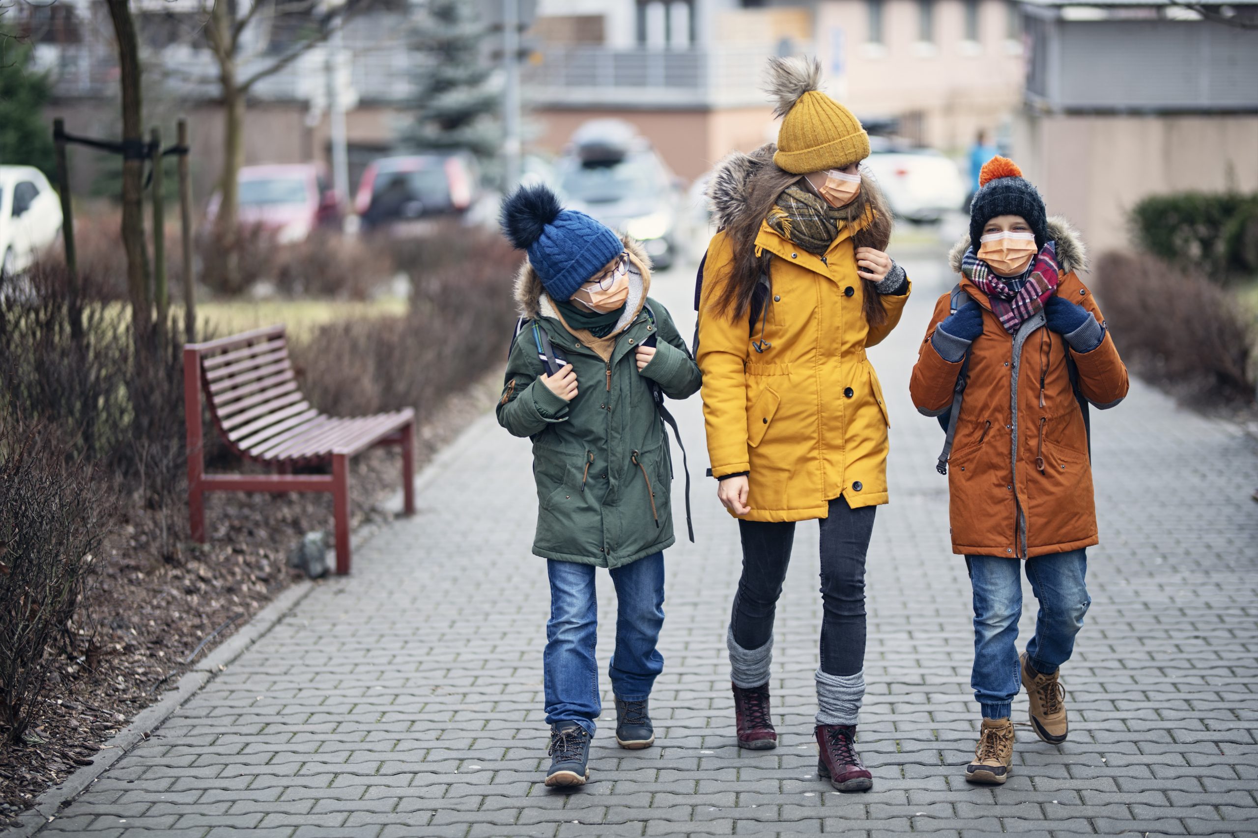 Three kids wearing anti virus masks. Kids are going to school. 
Shot with BMPCC4k with Q0 Raw