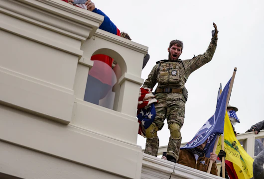 WASHINGTON, DC - JANUARY 06: Pro-Trump supporters storm the U.S. Capitol following a rally with President Donald Trump on January 6, 2021 in Washington, DC. Trump supporters gathered in the nation's capital today to protest the ratification of President-elect Joe Biden's Electoral College victory over President Trump in the 2020 election. (Photo by Samuel Corum/Getty Images)