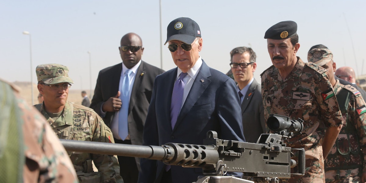 ZARQA, JORDAN - MARCH 10: U.S Vice President Joe Biden (C) reviews weapons and troops during a visit with Jordan's King Abdullah (not pictured) at a joint Jordanian-American training center on March 10, 2016 in Zarqa northeast of Amman, Jordan. This is the final stop on Biden's Middle East tour that also took in Israel and the Palestinian territories. (Photo by Jordan Pix/Getty Images)
