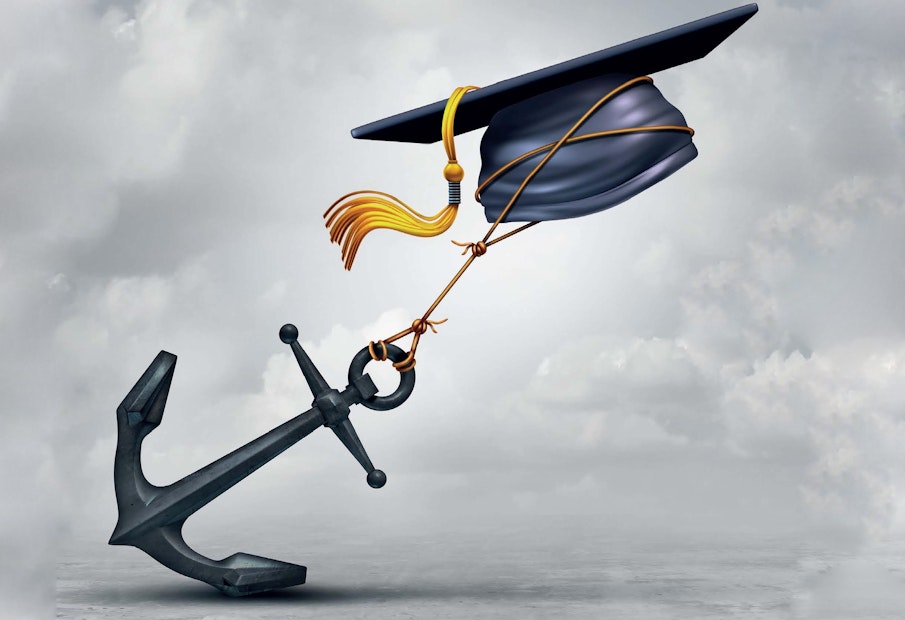 a graduation cap is being lifted by an anchor