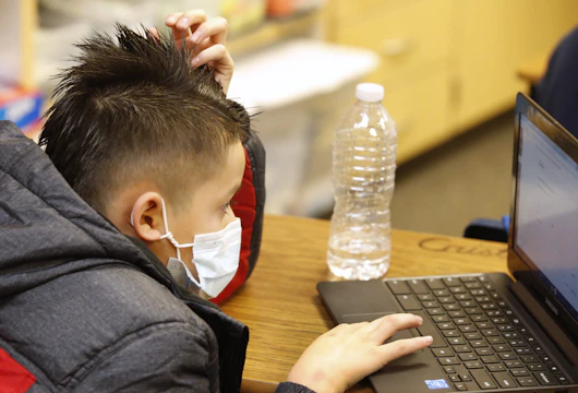 PROVO, UT - FEBRUARY 10: A student works on a computer at Freedom Preparatory Academy on February 10, 2021 in Provo, Utah. Freedom Academy has done in person instruction since the middle of August of 2020 with only four days of school canceled due to COVID-19 outbreak. (Photo by George Frey/Getty Images)