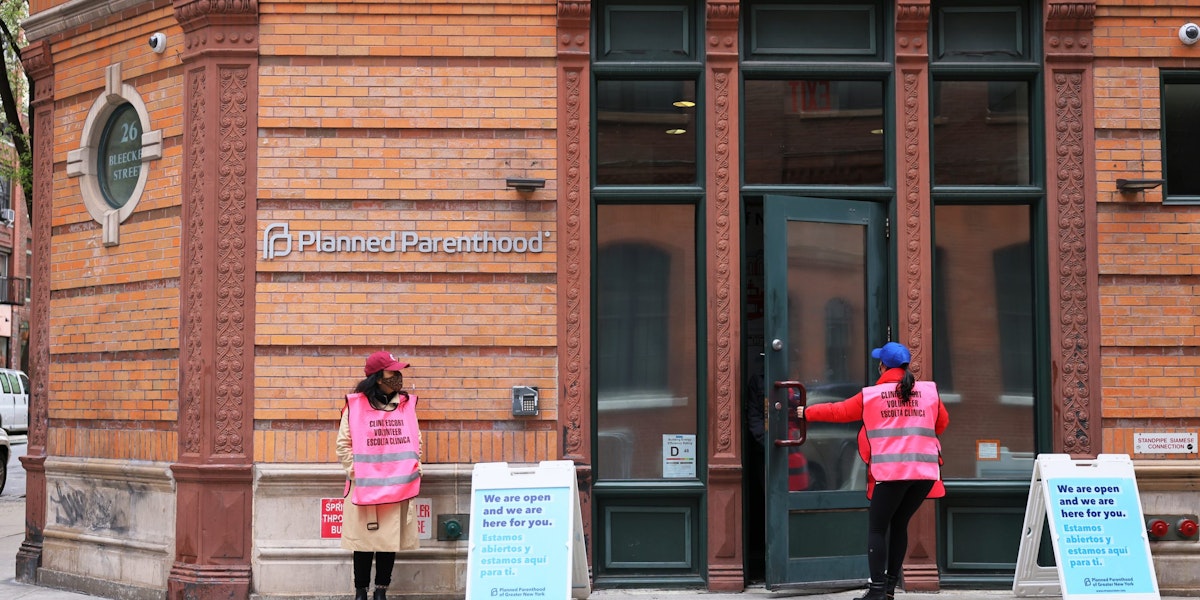 NEW YORK, NEW YORK - APRIL 16: Clinic escort volunteers stand outside of the Planned Parenthood in the Financial District neighborhood of Manhattan on April 16, 2021 in New York City. The Biden administration's Department of Health and Human Services has begun the process of undoing a Trump administration policy,  known as Title X, that stripped federal family-planning dollars from clinics that refer patients for abortions, a move that drove Planned Parenthood to withdraw from the program.  (Photo by Michael M. Santiago/Getty Images)