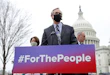 WASHINGTON, DC - MARCH 17: Sen. Jeff Merkley (C) (D-OR), Senate Majority Leader Chuck Schumer (R) (D-NY), and Sen. Amy Klobuchar (L) (D-MN) announce the introduction of S.1., the ‘For the People’ Act, outside the U.S. Capitol March 17, 2021 in Washington, DC. The “For the People Act” aims to make it simpler for eligible Americans to vote in elections. (Photo by Win McNamee/Getty Images)