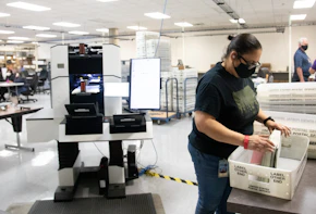 PHOENIX, AZ - OCTOBER 31: A Maricopa County Elections Department staff member counts ballots ahead of Tuesdays election on October 31, 2020 in Phoenix, Arizona. Early voting lasted from October 7th through the 30th in Arizona, which had a record number of early voters. (Photo by Courtney Pedroza/Getty Images)