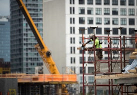 NEW YORK, NY - AUGUST 16: A construction laborer works on the site of a new residential building in the Hudson Yards development, August 16, 2016 in New York City. Home construction in the U.S. accelerated in July to the fastest pace in five months. While housing starts were up 2.1 percent nationally, new construction was up 15.5 percent in the Northeast, led by a surge in new apartment and condo construction. (Photo by Drew Angerer/Getty Images)