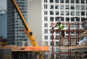 NEW YORK, NY - AUGUST 16: A construction laborer works on the site of a new residential building in the Hudson Yards development, August 16, 2016 in New York City. Home construction in the U.S. accelerated in July to the fastest pace in five months. While housing starts were up 2.1 percent nationally, new construction was up 15.5 percent in the Northeast, led by a surge in new apartment and condo construction. (Photo by Drew Angerer/Getty Images)