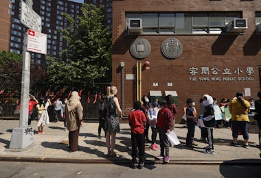 NEW YORK, NEW YORK - MAY 21: Students and faculty join together in front of Yung Wing School P.S. 124 on May 21, 2021 in New York City. May is Asian/Pacific American Heritage month and awareness has spiked due to incidents of Asian racism and other acts of hatred in the age of COVID-19. Schools across the Lower East Side held rallies in response to the recent violence against the AAPI community.  (Photo by Michael Loccisano/Getty Images)
