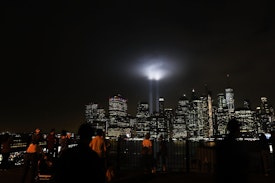 NEW YORK, NY - SEPTEMBER 11:  The 'Tribute in Light' memorial lights up lower Manhattan near One World Trade Center on September 11, 2018 in New York City. The tribute at the site of the World Trade Center towers has been an annual event in New York since March 11, 2002.Throughout the country services are being held to remember the 2,977 people who were killed in New York, the Pentagon and rural Pennsylvania in the terrorist attacks on September 11, 2001.  (Photo by Spencer Platt/Getty Images)