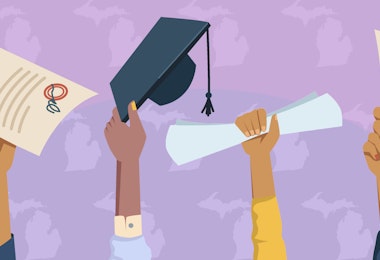 a group of people raising their hands in the air