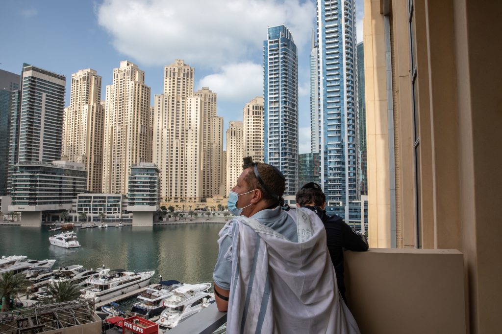 Local Jewish residents and tourists pray during Purim on February 26, 2021 in Dubai. The small but vibrant community has become more visible since the signing of the Abraham Accords, which normalized relations between the United Arab Emirates and Israel. Source: Andrea DiCenzo/Getty Images.