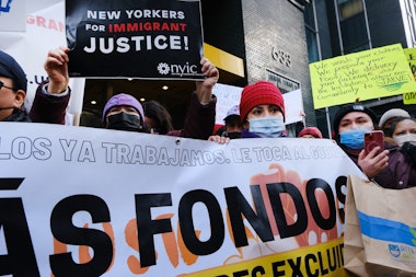 NEW YORK, NEW YORK - DECEMBER 10: Excluded workers, New Yorkers who had been shut out of pandemic-era assistance, march with their community allies to Governor Kathy Hochul’s midtown office on December 10, 2021 in New York City. The workers, most of whom are recent immigrants to America, are demanding an additional $3 billion for the Excluded Workers Fund. The Excluded Workers Fund was set up earlier this year to provide financial support for New Yorkers who had been shut out of pandemic-era assistance including stimulus checks and unemployment insurance. (Photo by Spencer Platt/Getty Images)