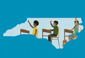 a group of people sitting at desks in the shape of a map