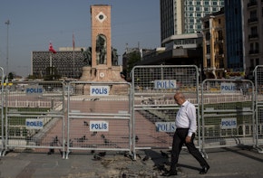 ISTANBUL, TURKEY - MAY 31: A man walks past police barricades surrounding Taksim Square and Gezi Park on the third anniversary of the Gezi Park protests on May 31, 2016 in Istanbul, Turkey. The protests began on May 28, 2013 to contest the planned urban development of Gezi Park, however larger protests started after police evicted protesters from the park sparking weeks of civil unrest.  (Photo by Chris McGrath/Getty Images)