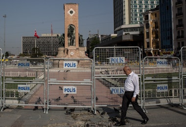 ISTANBUL, TURKEY - MAY 31: A man walks past police barricades surrounding Taksim Square and Gezi Park on the third anniversary of the Gezi Park protests on May 31, 2016 in Istanbul, Turkey. The protests began on May 28, 2013 to contest the planned urban development of Gezi Park, however larger protests started after police evicted protesters from the park sparking weeks of civil unrest.  (Photo by Chris McGrath/Getty Images)