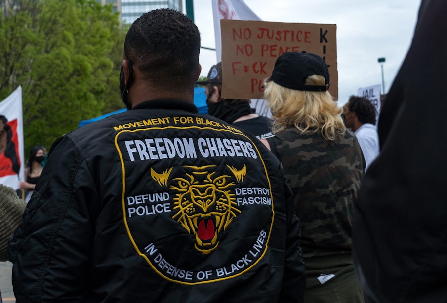 ATLANTA, GA - APRIL 14: Demonstrators march to the National Center for Civil and Human Rights while protesting the shooting death of Daunte Wright on April 14, 2021 in Atlanta, Georgia. Wright, a Black man who was stopped in Minnesota on Sunday, reportedly for an expired registration, was shot and killed by an officer who police say mistook her service revolver for a Taser.  (Photo by Megan Varner/Getty Images)