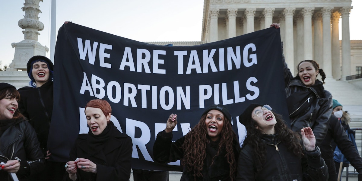 WASHINGTON, DC - DECEMBER 01: Protesters, demonstrators and activists gather in front of the U.S. Supreme Court as the justices hear arguments in Dobbs v. Jackson Women's Health, a case about a Mississippi law that bans most abortions after 15 weeks, on December 01, 2021 in Washington, DC. With the addition of conservative justices to the court by former President Donald Trump, experts believe this could be the most important abortion case in decades and could undermine or overturn Roe v. Wade. (Photo by Chip Somodevilla/Getty Images)