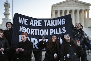 WASHINGTON, DC - DECEMBER 01: Protesters, demonstrators and activists gather in front of the U.S. Supreme Court as the justices hear arguments in Dobbs v. Jackson Women's Health, a case about a Mississippi law that bans most abortions after 15 weeks, on December 01, 2021 in Washington, DC. With the addition of conservative justices to the court by former President Donald Trump, experts believe this could be the most important abortion case in decades and could undermine or overturn Roe v. Wade. (Photo by Chip Somodevilla/Getty Images)