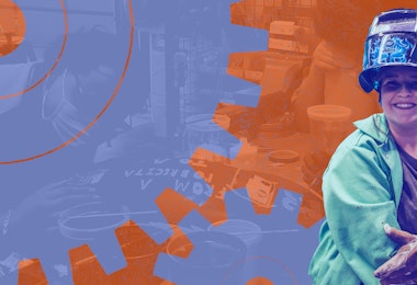 A woman wearing a welding face shield