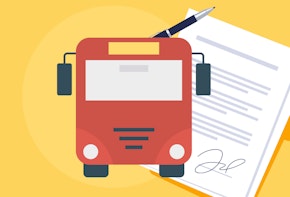 A red bus in front of a signed document.