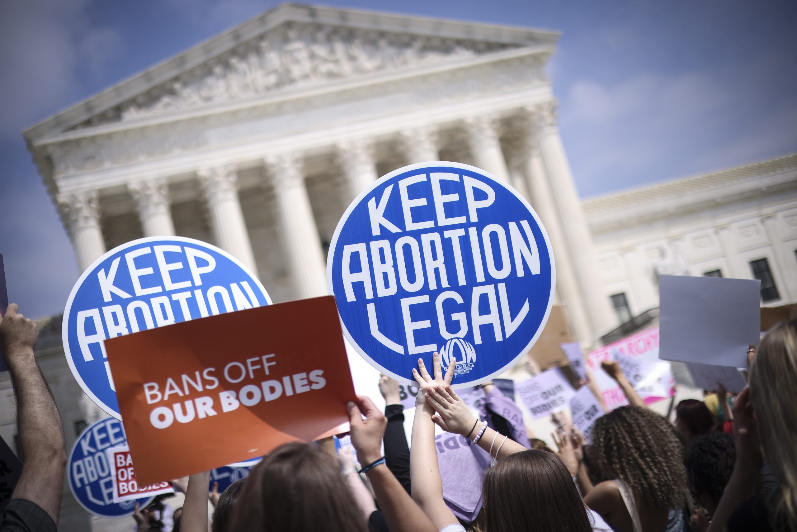 WASHINGTON, DC - MAY 03: Pro-choice and anti-abortion activists demonstrate in front of the U.S. Supreme Court Building on May 03, 2022 in Washington, DC. In a leaked initial draft majority opinion obtained by Politico and authenticated by Chief Justice John Roberts, Supreme Court Justice Samuel Alito wrote that the cases Roe v. Wade and Planned Parenthood of Southeastern Pennsylvania v. Casey should be overturned, which would end federal protection of abortion rights across the country. (Photo by Win McNamee/Getty Images)