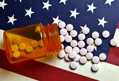 Prescription Pills spilled on USA flag