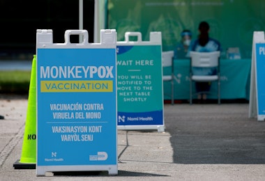 MIAMI, FLORIDA - AUGUST 15: A sign announcing monkeypox vaccination is setup in Tropical Park by Miami-Dade County and Nomi Health on August 15, 2022 in Miami, Florida. Miami-Dade continues to urge people to vaccinate as they work to get more vaccines now that the county has over 400 cases, which is the most in the state. (Photo by Joe Raedle/Getty Images)