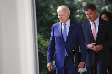 WASHINGTON, DC - SEPTEMBER 15: U.S. President Joe Biden walks with Labor Secretary Marty Walsh before an event in the Rose Garden of the White House September 15, 2022 in Washington, DC. During the event Biden announced a tentative labor agreement between freight rail companies and unions representing tens of thousands of workers. (Photo by Anna Moneymaker/Getty Images)