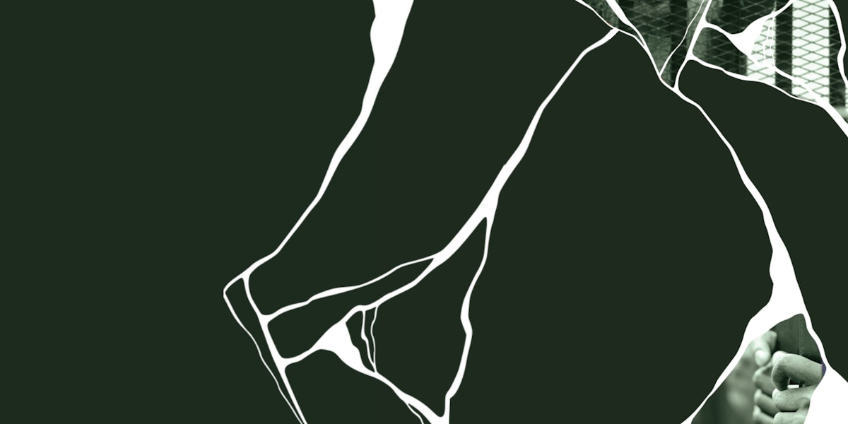 A green backdrop with white, cracked lines throughout, representing a shattered image.