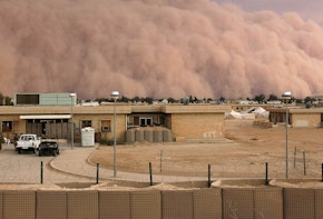 A dust storm bellows across the western desert of Iraq in April 2005. Sand and dust storms have become more frequent and devastating in recent years. Source: Shannon Arledge/USMC via Getty Images