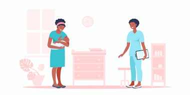 A Black pregnant woman visiting the doctor for examination.
