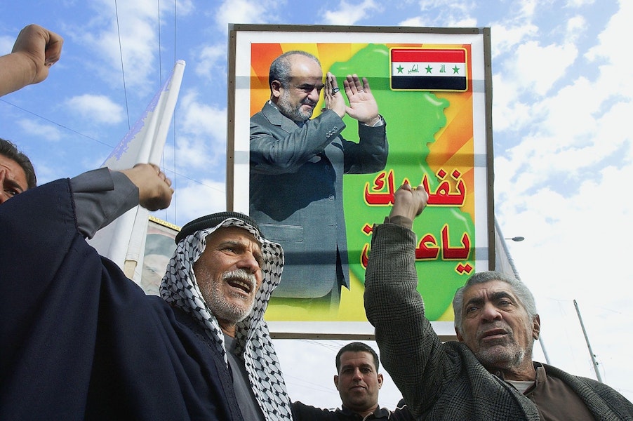 BAGHDAD, IRAQ - DECEMBER 25: Iraqi Shiites carry a picture of Iraq's Prime Minister Ibrahim al-Jaafari during a demonstration on December 25, 2005 in Baghdad, Iraq. Iraqi shiites shout slogans in favour of the results of the elections
 during a demonstration  in al-Sadr city eastren of Baghdad.
 (Photo by Wathiq Khuzaie /Getty Images)